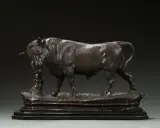 Sculpture en bronze d'un taureau puissant, œuvre de Charles Valton, se tenant sur un socle rocheux.